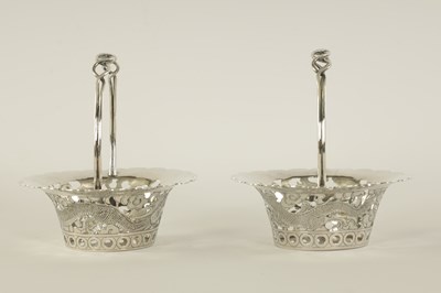 Lot 120 - A PAIR OF CHINESE SILVER SWEETMEAT BASKETS