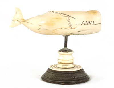 Lot 527 - A 19TH CENTURY SCRIMSHAW-CARVED MARINE IVORY SCULPTURE MODELLED AS A SPERM WHALE