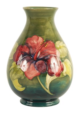 Lot 1268 - A WALTER MOORCROFT BALUSTER VASE