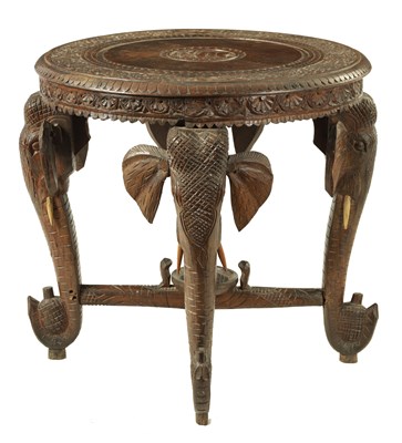 Lot 216 - A LATE 19TH CENTURY CARVED INDIAN 'ELEPHANT' TABLE
