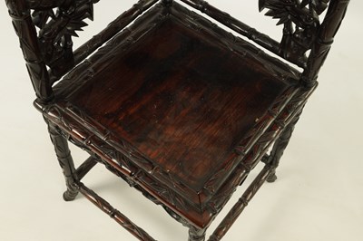 Lot 136 - A 19TH CENTURY CHINESE CARVED ROSEWOOD CORNER CHAIR