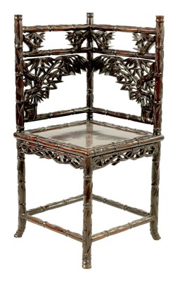 Lot 136 - A 19TH CENTURY CHINESE CARVED ROSEWOOD CORNER CHAIR