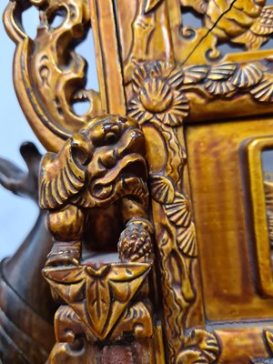 Lot 179 - AN EARLY 20TH CENTURY CHINESE LACQUERED AND GILT CARVED FIRE SCREEN