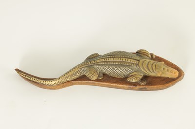 Lot 111 - A LATE 19TH CENTURY CARVED HORN CROCODILE SCULPTURE