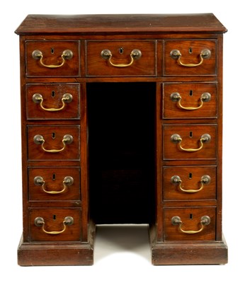 Lot 887 - AN UNUSUAL EARLY GEORGE III MAHOGANY KNEEHOLE DESK