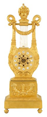 Lot 701 - GUILET, PARIS. AN EARLY 19TH CENTURY FRENCH ORMOLU LYRE-SHAPED MANTEL CLOCK