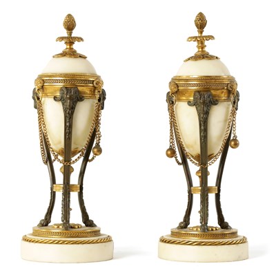 Lot 467 - A PAIR OF 19TH CENTURY ADAM STYLE BRONZE AND ORMOLU MOUNTED WHITE MARBLE REVERSIBLE URNS/CANDLESTICKS