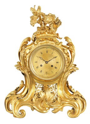 Lot 656 - AN EARLY 18TH CENTURY FRENCH ORMOLU ROCOCO MANTEL CLOCK