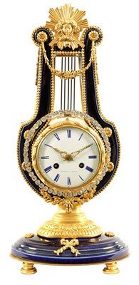 Lot 817 - PERRIN, A PARIS. A FRENCH 19TH CENTURY PORCELAIN AND ORMOLU LYRE SHAPED MANTEL CLOCK