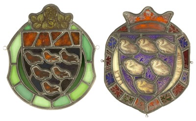 Lot 485 - TWO STAINED GLASS ARMORIAL SHIELD SHAPED PANELS ONE EARLY 18TH CENTURY THE OTHER 19TH CENTURY