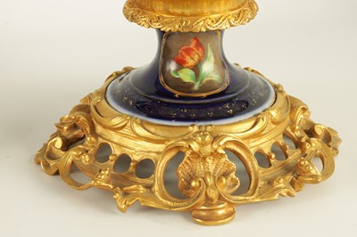 Lot 68 - A PAIR OF 19TH CENTURY CONTINENTAL ORMOLU MOUNTED PORCELAIN LAMP BASES