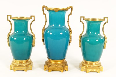 Lot 77 - A GOOD GARNITURE OF THREE 19TH CENTURY TURQUOISE GLAZED CHINESE VASES WITH ORMOLU MOUNTS