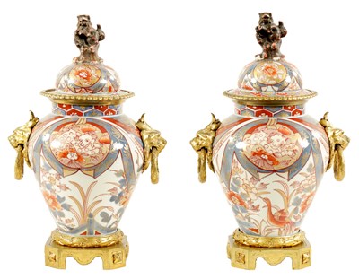 Lot 92 - A PAIR OF 18TH CENTURY JAPANESE IMARI VASES AND COVERS WITH ORMOLU MOUNTS
