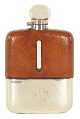 Lot 299 - A MID 20TH CENTURY SILVER MOUNTED AND PIG SKIN HIP FLASK