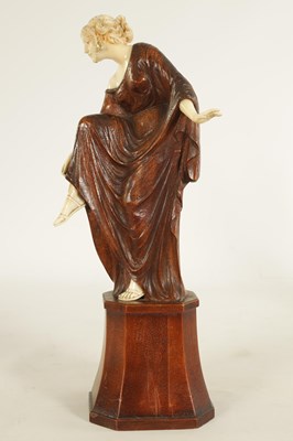 Lot 787 - LEONIE BOEHM-HENNES. AN ART NOUVEAU MIXED MEDIA  WALNUT AND IVORY CARVED SCULPTURE OF A YOUNG LADY