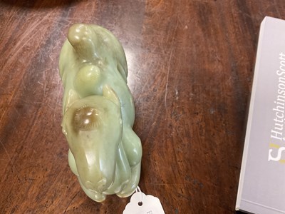Lot 189 - A LARGE CHINESE RUSSET JADE CARVED SCULPTURE OF A RECUMBENT CAMEL