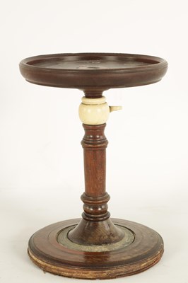 Lot 561 - AN 18TH CENTURY MAHOGANY ADJUSTABLE CANDLE STAND