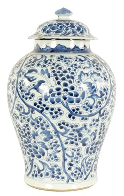 Lot 210 - AN 18TH CENTURY CHINESE BLUE AND WHITE TAPERING SHOULDERED VASE AND COVER