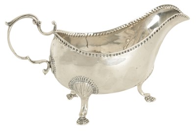 Lot 312 - A GEORGE III IRISH SILVER SAUCE BOAT