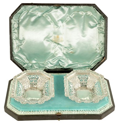 Lot 332 - A CASED PAIR OF VICTORIAN SILVER SWEATMEAT DISHES