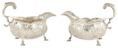 Lot 341 - A PAIR OF EARLY GEORGE III IRISH SILVER SAUCE BOATS OF GENEROUS SIZE
