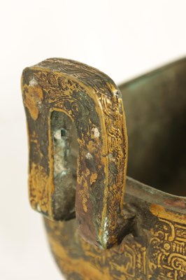 Lot 203 - AN EARLY CHINESE GILT BRONZE FOOD VESSEL