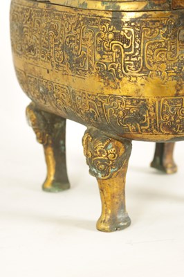 Lot 203 - AN EARLY CHINESE GILT BRONZE FOOD VESSEL