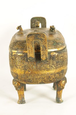 Lot 203 - AN EARLY CHINESE GILT BRONZE FOOD VESSEL