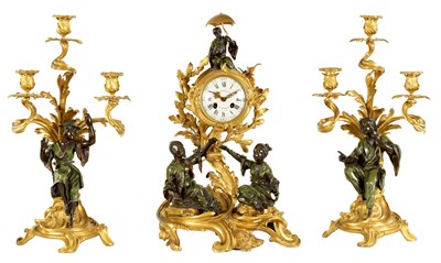 Lot 661 - J. B. BAILLON A’PARIS. A FINE LOUIS XV FRENCH ROCOCO PATINATED BRONZE AND ORMOLU THREE PIECE CLOCK GARNITURE