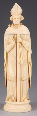 Lot 517 - A 19TH CENTURY CARVED IVORY FIGURE OF A...