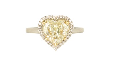 Lot 233 - A LADIES PLATINUM 2.23CT FANCY YELLOW HEART SHAPED SOLITAIRE DIAMOND RING