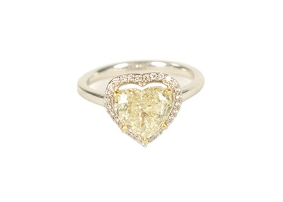 Lot 233 - A LADIES PLATINUM 2.23CT FANCY YELLOW HEART SHAPED SOLITAIRE DIAMOND RING