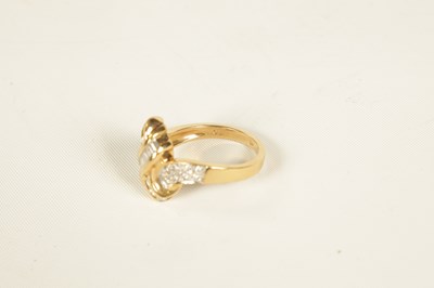 Lot 238 - A LADIES 14CT YELLOW GOLD DIAMOND KNOT RING