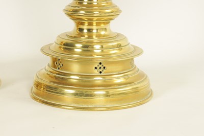 Lot 10 - A PAIR OF LATE 19TH CENTURY BRASS OVERSIZED GOTHIC STYLE CANDLESTICKS