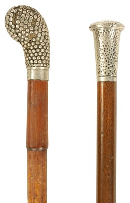 Lot 358 - TWO LATE 19TH CENTURY SILVER TOPPED WALKING STICKS