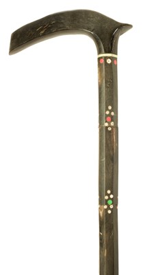 Lot 350 - A 19TH CENTURY ANGLO INDIAN SECTIONAL HORN AND MOTHER OF PEARL INLAID WALKING STICK