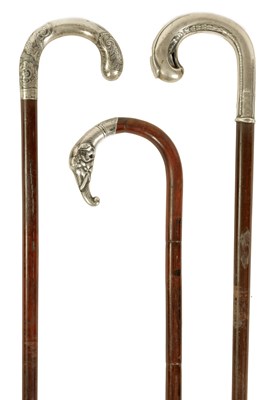 Lot 357 - A SELECTION OF THREE ART NOVEAU FRENCH SILVER TOPPED WALKING STICKS