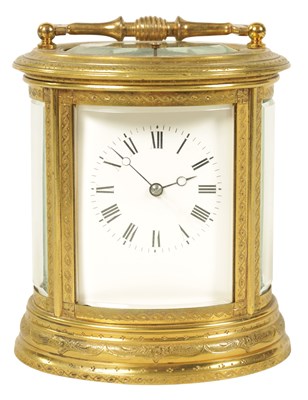 Lot 743 - MARGAINE. A 19TH CENTURY ENGRAVED OVAL REPEATING FRENCH CARRIAGE CLOCK