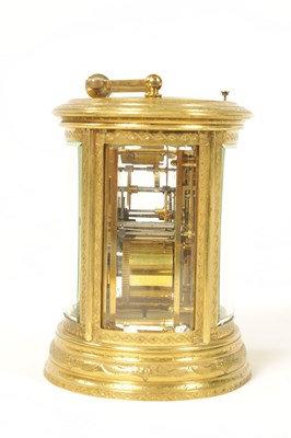 Lot 743 - MARGAINE. A 19TH CENTURY ENGRAVED OVAL REPEATING FRENCH CARRIAGE CLOCK