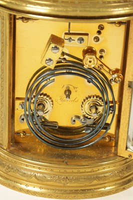 Lot 743 - MARGAINE. A 19TH CENTURY ENGRAVED OVAL REPEATING FRENCH CARRIAGE CLOCK