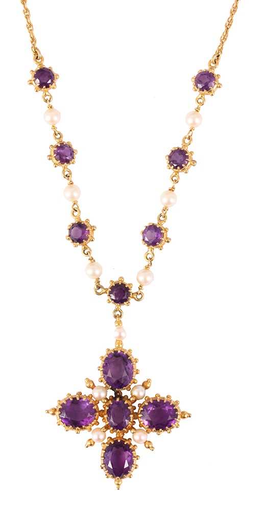 Lot 199 - A LADIES 9CT GOLD AND PURPLE STONE NECKLACE...
