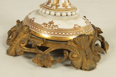 Lot 1352 - A 19TH CENTURY RUSSIAN PORCELAIN GILT HIGHLIGHTED AND ORMOLU-MOUNTED LAMP