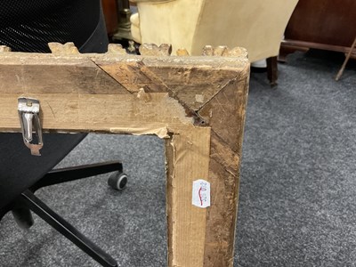Lot 1050 - AN 18TH CENTURY LEAF CARVED GILT FRAME