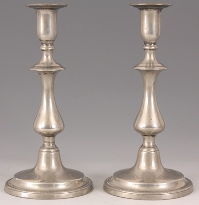 Lot 278 - A PAIR OF GEORGE III PEWTER CANDLESTICKS with...