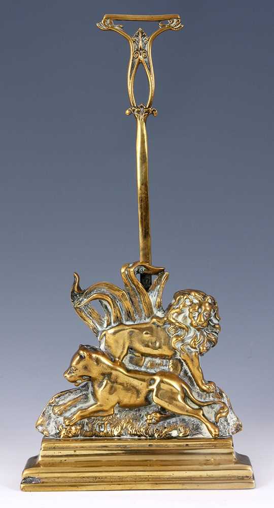 Lot 282 - A VICTORIAN LION AND LIONESS CAST BRASS DOOR...