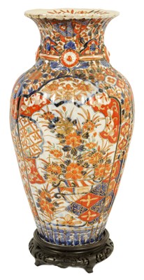 Lot 1364 - A 19TH CENTURY IMARI RIBBED OVOID VASE ON STAND