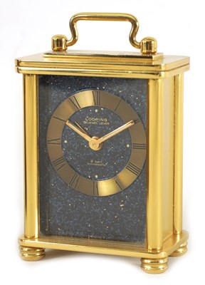 Lot 760 - A 20TH CENTURY LOOPING 8-DAY ANTIMAGNETIC SWISS BRASS CASED TRAVELLING CLOCK