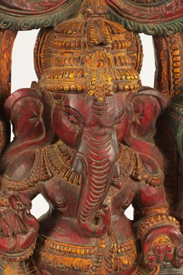 Lot 126 - A LARGE CARVED AND PAINTED WOOD GANESHA