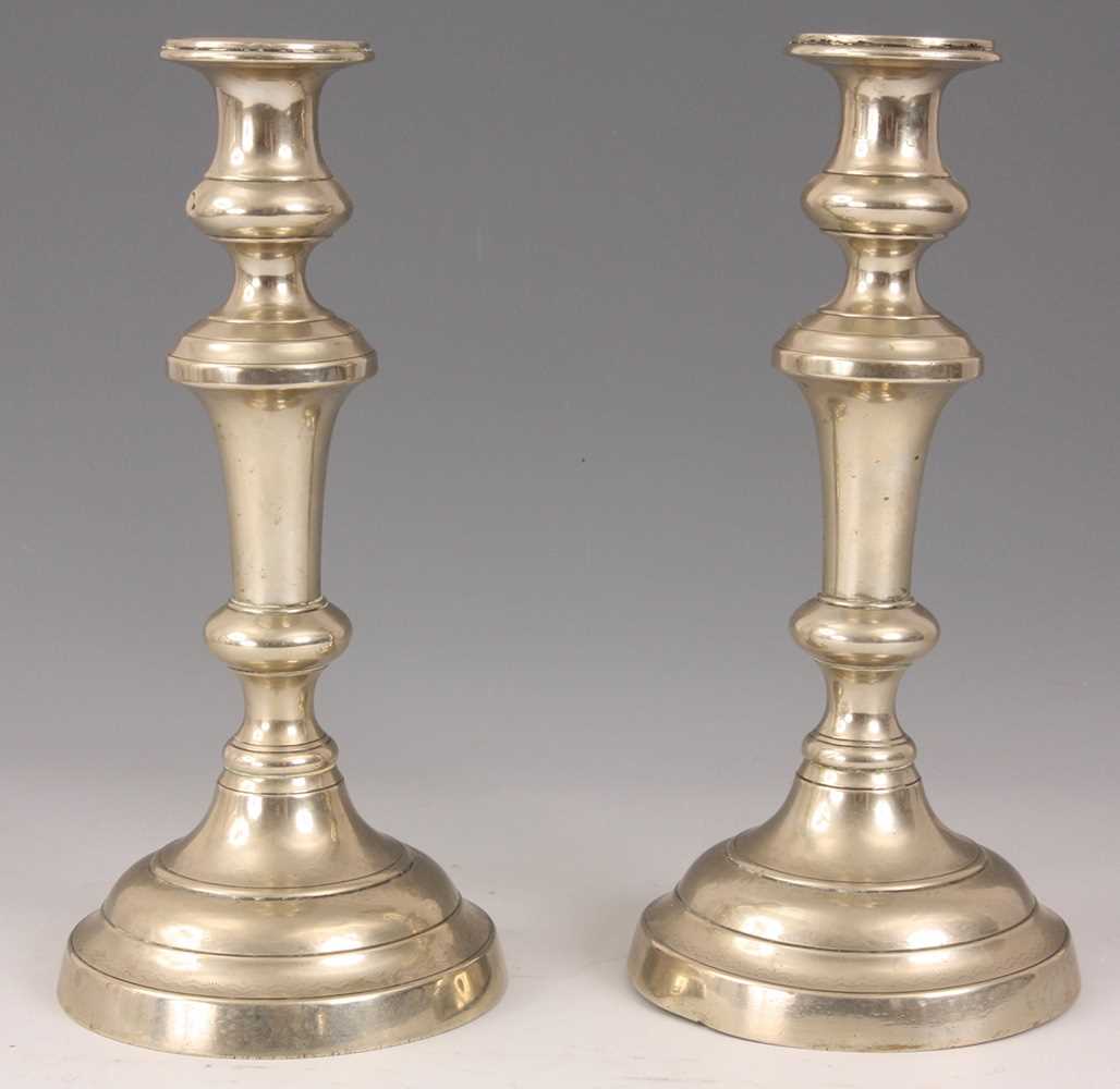 Lot 275 - A PAIR OF GEORGE III PAKTONG CANDLESTICKS the...