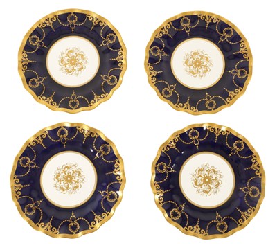 Lot 57 - A SET OF FOUR ROYAL CROWN DERBY BONE CHINA SCALLOPED MOULDED EDGE CABINET PLATES